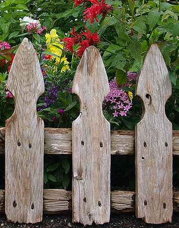 Wooden Picket Fence and Flower Garden